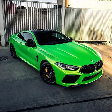 BMW car wrapped in Kelly Green (RB22-HD) vinyl, standing out with a bold green gloss finish and sleek black accents.