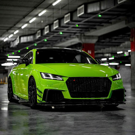 Stylish sports car wrapped in TeckWrap La Palma Green (CG35-HD) Gloss Vinyl, showcasing the wrap's reflective finish and dynamic aesthetic in an urban setting.