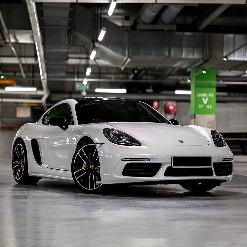 Side-angle close-up of a vehicle wrapped in Teckwrap Lavender Pearl (CK526-HD) gloss vinyl wrap, showcasing the elegant, reflective lavender tones enhancing the car's curves.