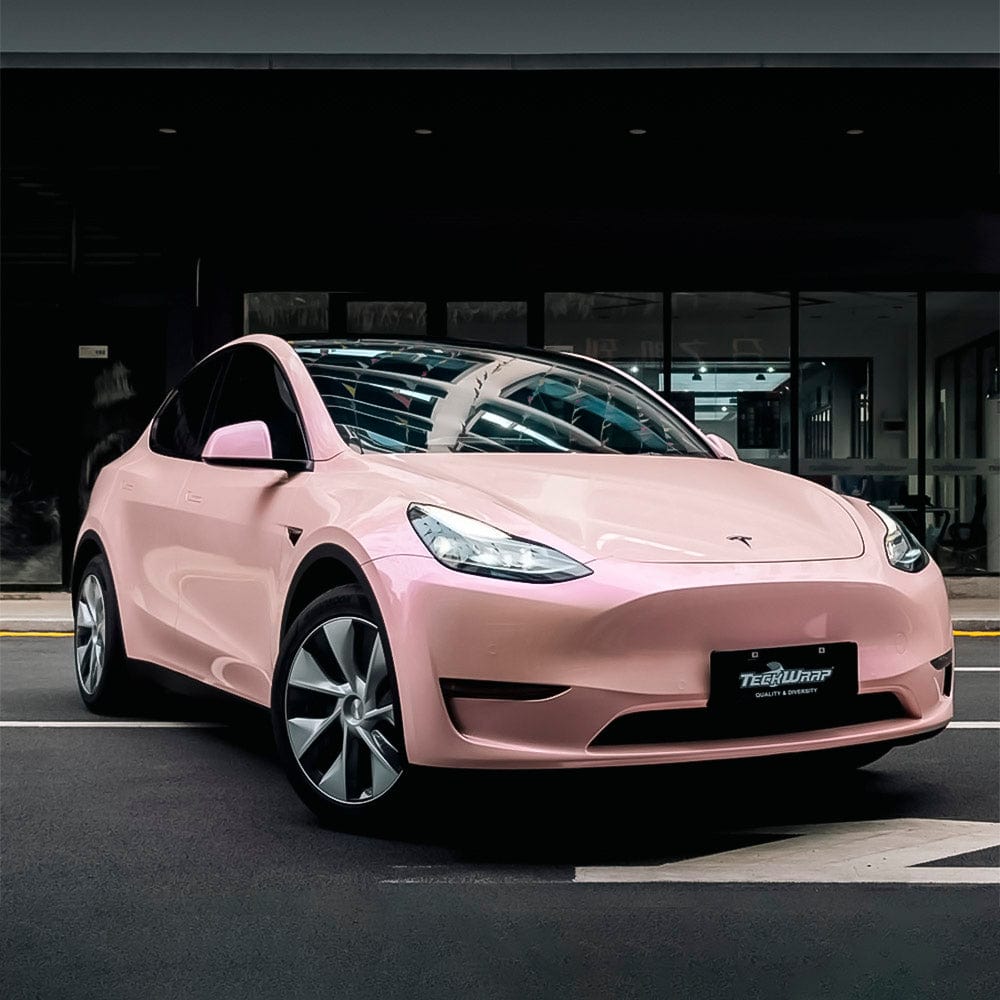 Tesla Model Y wrapped in Maize Pink (DS06-HD) Gloss Vinyl by TeckWrap, demonstrating a sophisticated and glossy pastel appearance, perfect for unique vehicle styling.