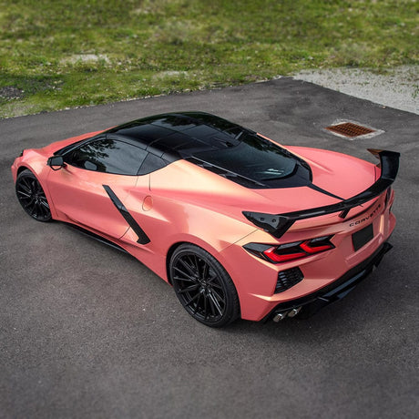 Corvette wrapped in TeckWrap Coral Peach RB08-HD gloss metallic vinyl parked on asphalt