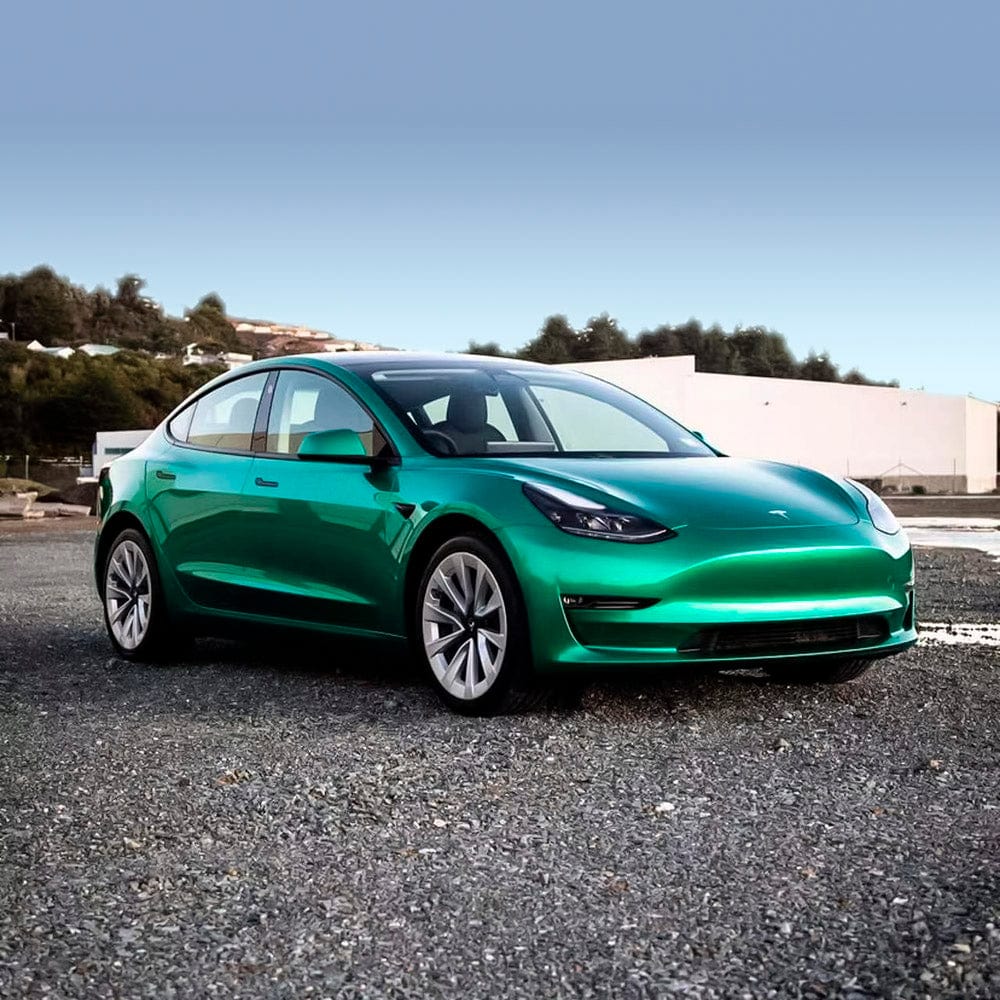 Tesla Model 3 wrapped in TeckWrap Ocean Green Gloss Vinyl, demonstrating its bold color, smooth gloss, and premium finish.