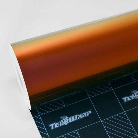 Roll of TeckWrap Ruby Gold (RD13-HD) Gloss Vinyl Wrap displaying vibrant metallic hues transitioning from deep ruby to luxurious gold.