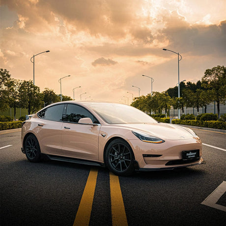 Tesla car elegantly wrapped in Sahara Beige (CG46-HD) TeckWrap Gloss Vinyl, highlighting its sophisticated appearance and high-gloss surface under a golden sunset.