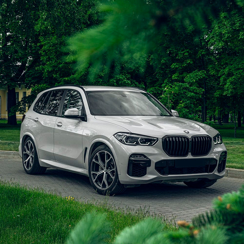 BMW X5 SUV wrapped in TeckWrap Slate Grey (CG16-HD) Gloss Vinyl, featuring a sleek, glossy finish with a soft grey hue — a perfect blend of modern elegance and premium wrap performance.