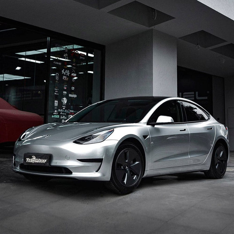 Tesla wrapped in TeckWrap Super Silver Mist (GAL11-HD) Gloss Vinyl, demonstrating a premium and sleek metallic silver appearance.