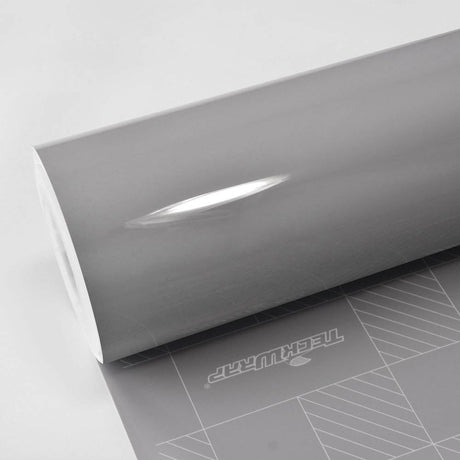 TeckWrap True Nardo Grey (CG27-HD) gloss vinyl wrap roll highlighting its smooth, high-gloss surface and refined grey tone.