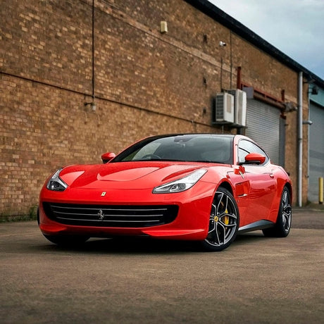Luxury Ferrari featuring TeckWrap Racing Red High Gloss Vinyl Wrap, illustrating the intense, polished shine and bold, sporty appeal.