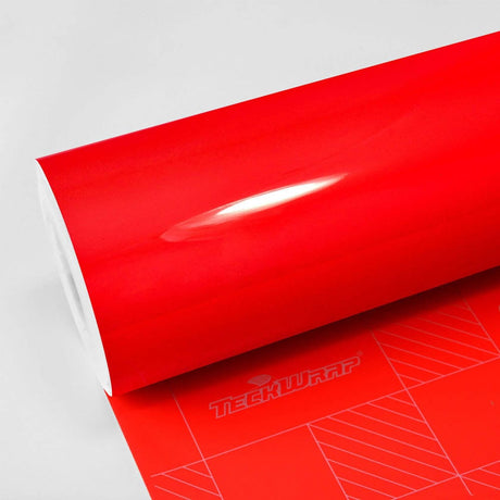 Roll of Racing Red High Gloss Vinyl Wrap by TeckWrap, highlighting its vivid, mirror-like shine ideal for vibrant vehicle transformations.