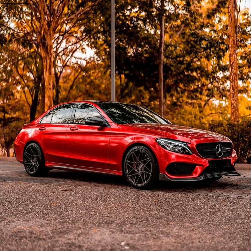 Mercedes-Benz elegantly wrapped in TeckWrap True Blood (GAL01R-HD) High Glossy Vinyl, demonstrating the bold, premium aesthetic and metallic red brilliance under natural light.