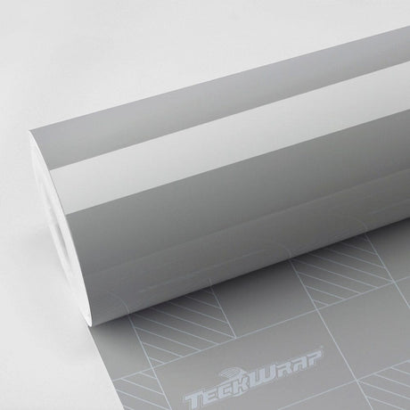 High-gloss TeckWrap Vintage Grey (CG47-HD) vinyl wrap roll with reflective finish on branded backing paper.