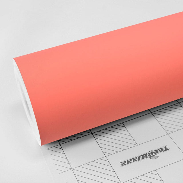 TeckWrap Autumn Blaze (SCM36) Matte Vinyl Wrap roll showcasing its smooth, elegant coral finish ideal for vehicle wrapping and customization.