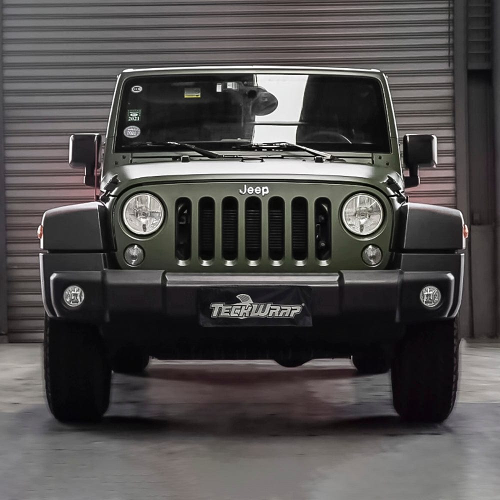 Front view of a Jeep showcasing the Piniengruen Pearl Matte Vinyl Wrap (TC02) by TeckWrap, demonstrating its robust, stylish matte-green finish.