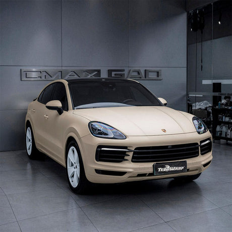 Porsche SUV wrapped in Vanilla Cream (SCM26-R) Matte Vinyl by TeckWrap, emphasizing a luxurious matte cream exterior