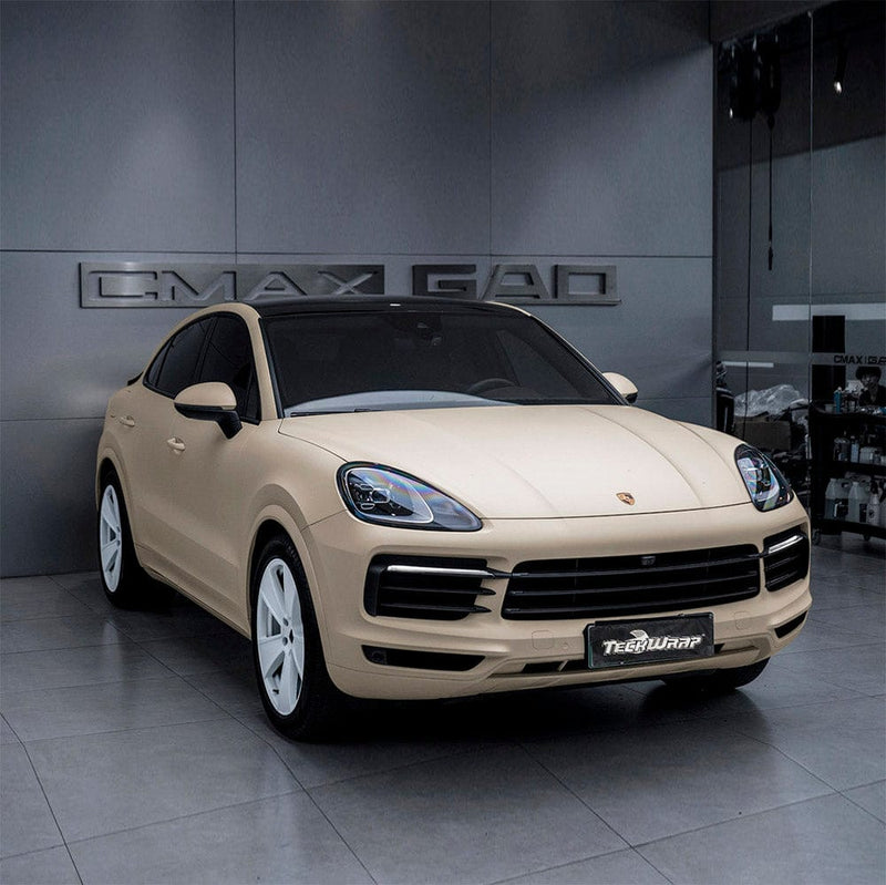 Porsche SUV wrapped in Vanilla Cream (SCM26-R) Matte Vinyl by TeckWrap, emphasizing a luxurious matte cream exterior