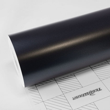 Apollo Grey (SMT06) Vinyl Wrap by TeckWrap shown in roll form with a soft satin metallic finish, highlighting its smooth surface and backing grid for precision cutting — ideal for car wrap professionals in the USA.