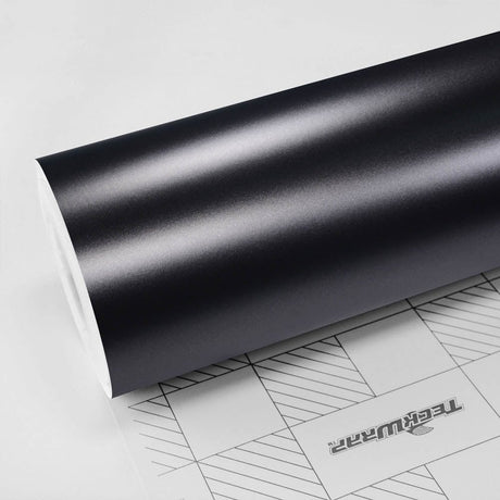 TeckWrap Dark Grey Silk (HM01) Satin Vinyl Wrap in roll form, showcasing a luxurious satin dark grey finish with a soft metallic sheen — perfect for premium automotive wrap applications across the USA.