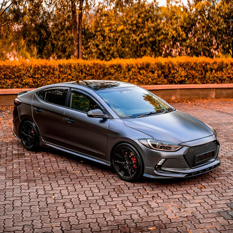 Sedan fully wrapped in TeckWrap Dark Platinum Satin Vinyl Wrap (ECH21) – sleek metallic finish with black wheels