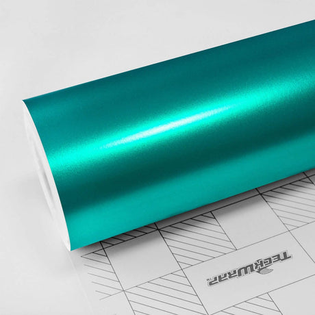TeckWrap Emerald Green Satin Vinyl Wrap roll showcasing a shimmering, satin finish ideal for automotive styling.