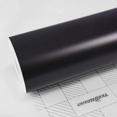 Roll of TeckWrap Matte Coal Black (MT01) Satin Vinyl Wrap featuring a refined matte finish, perfect for creating subtle, sophisticated vehicle styling.