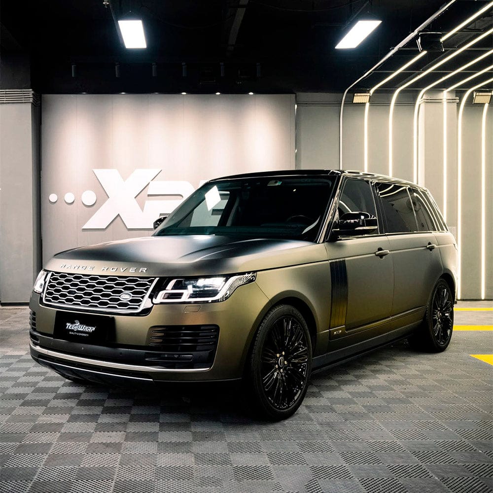 Range Rover wrapped in TeckWrap Mineral Grey (SMT01) Satin Vinyl Wrap, displaying a luxurious, sophisticated look with subtle metallic accents.