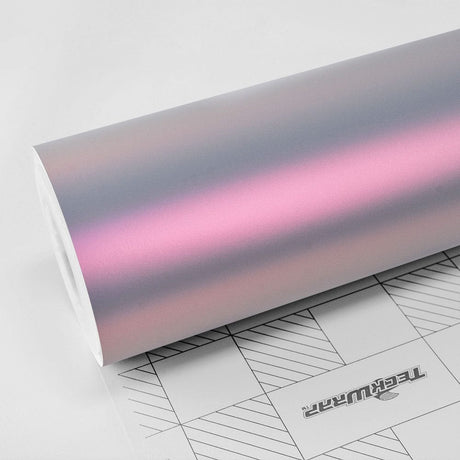 Close-up of TeckWrap Silver Sunset Matte (DS03M) Satin Vinyl Wrap roll showcasing a soft blend of silver and subtle pink hues.