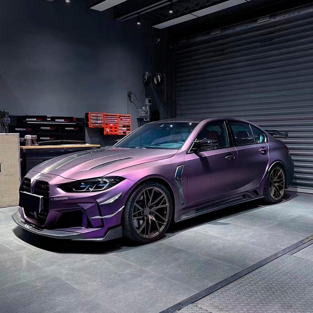 BMW customized with TeckWrap Satin Venetian Violet vinyl wrap (SMT03) in a professional detailing workshop, featuring a stylish matte-like purple finish.