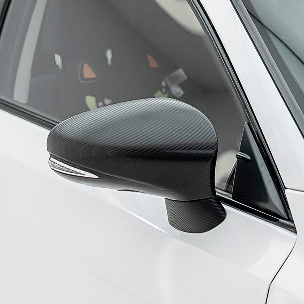 Side mirror wrapped with TeckWrap Pitch Black Carbon (CF02), accentuating its authentic carbon fiber look and precision detail.