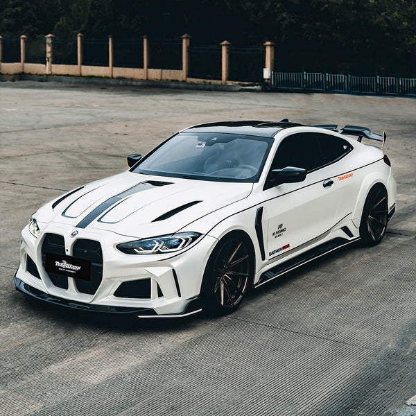 BMW wrapped in satin white vinyl with black accents