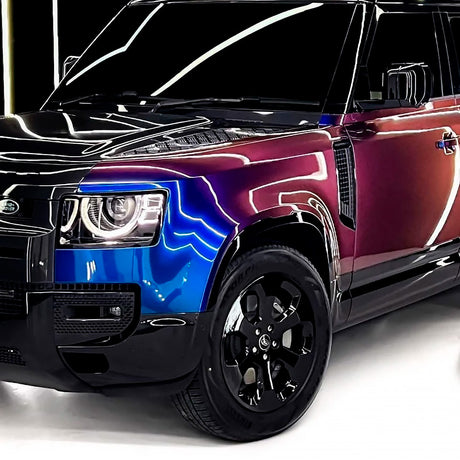 Partial front view of SUV with TeckWrap Violet Sunrise (RD14-HD) Gloss Vinyl Wrap, highlighting luxurious appearance and impressive multicolor glossy finish.