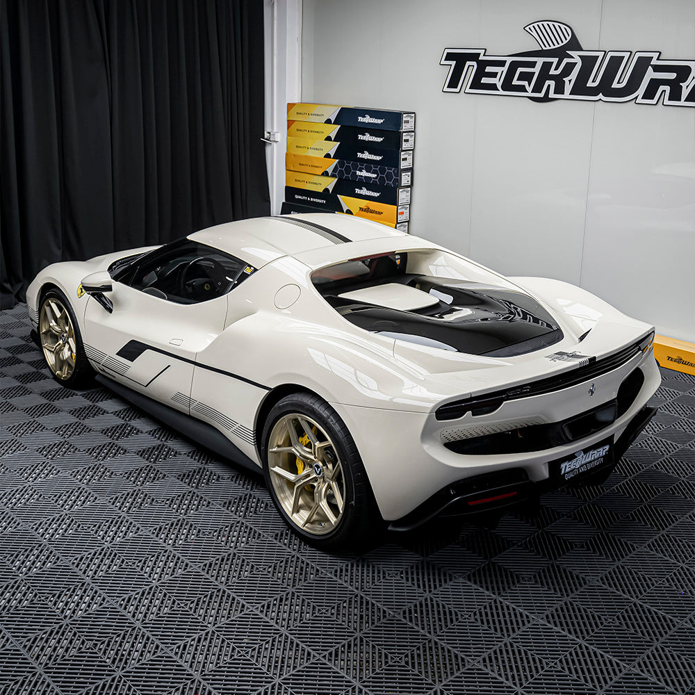 Ferrari 296 GTB wrapped in gloss vanilla wrap with custom stickers, backside view