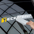 Removing backing from TeckWrap vinyl decal sticker installed on back glass
