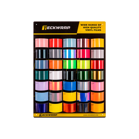 Display of colorful vinyl rolls with Steckwrap branding on a white background