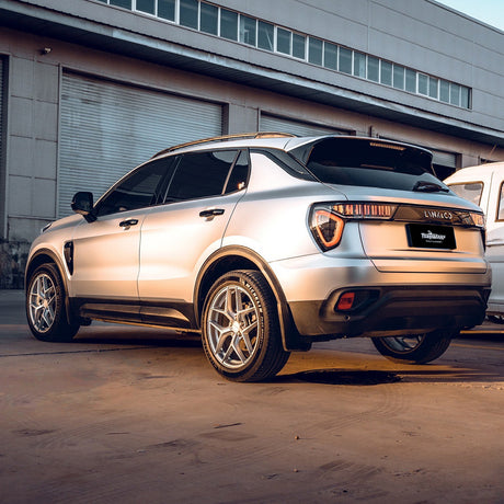 Rear-angle view of vehicle featuring TeckWrap Super Silver Sage (VCH411-S) satin vinyl wrap, highlighting its refined silver shade and smooth satin texture.