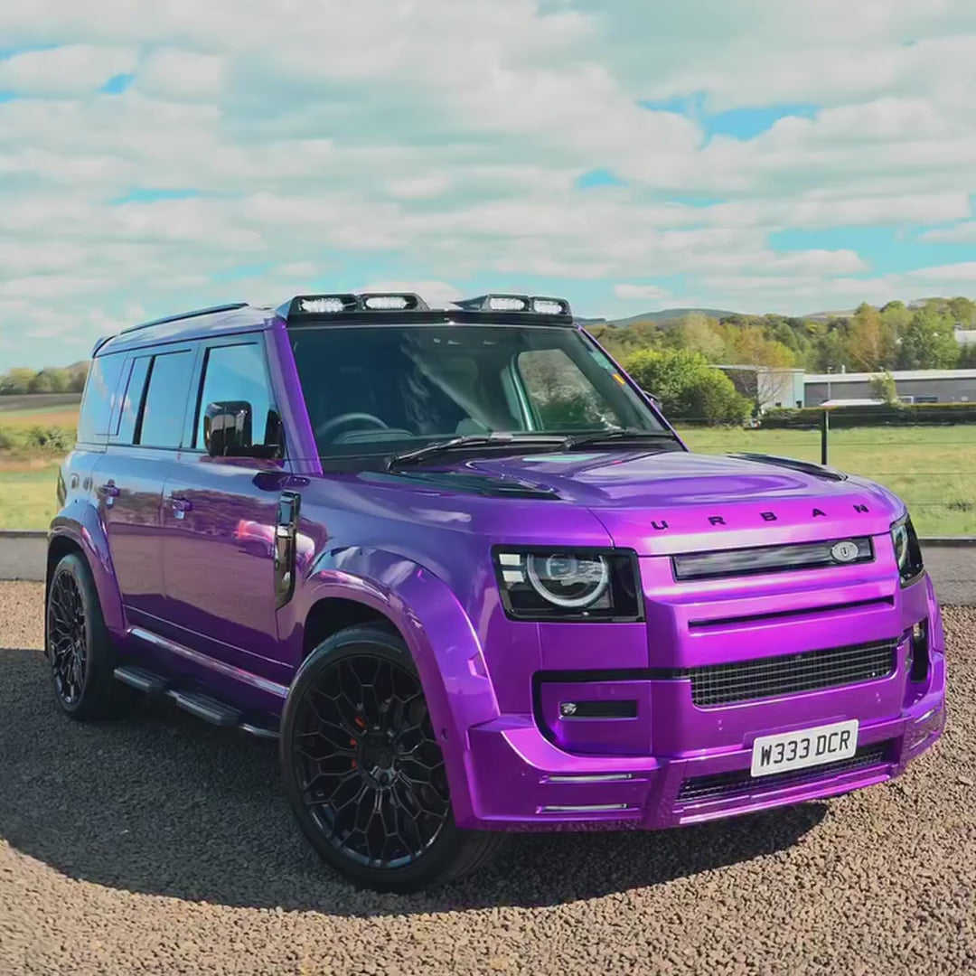 Land Rover Defender wrapped in TeckWrap Deep Gloss Candy Purple vinyl (GAL03-HD), rotating view of the candy purple finish