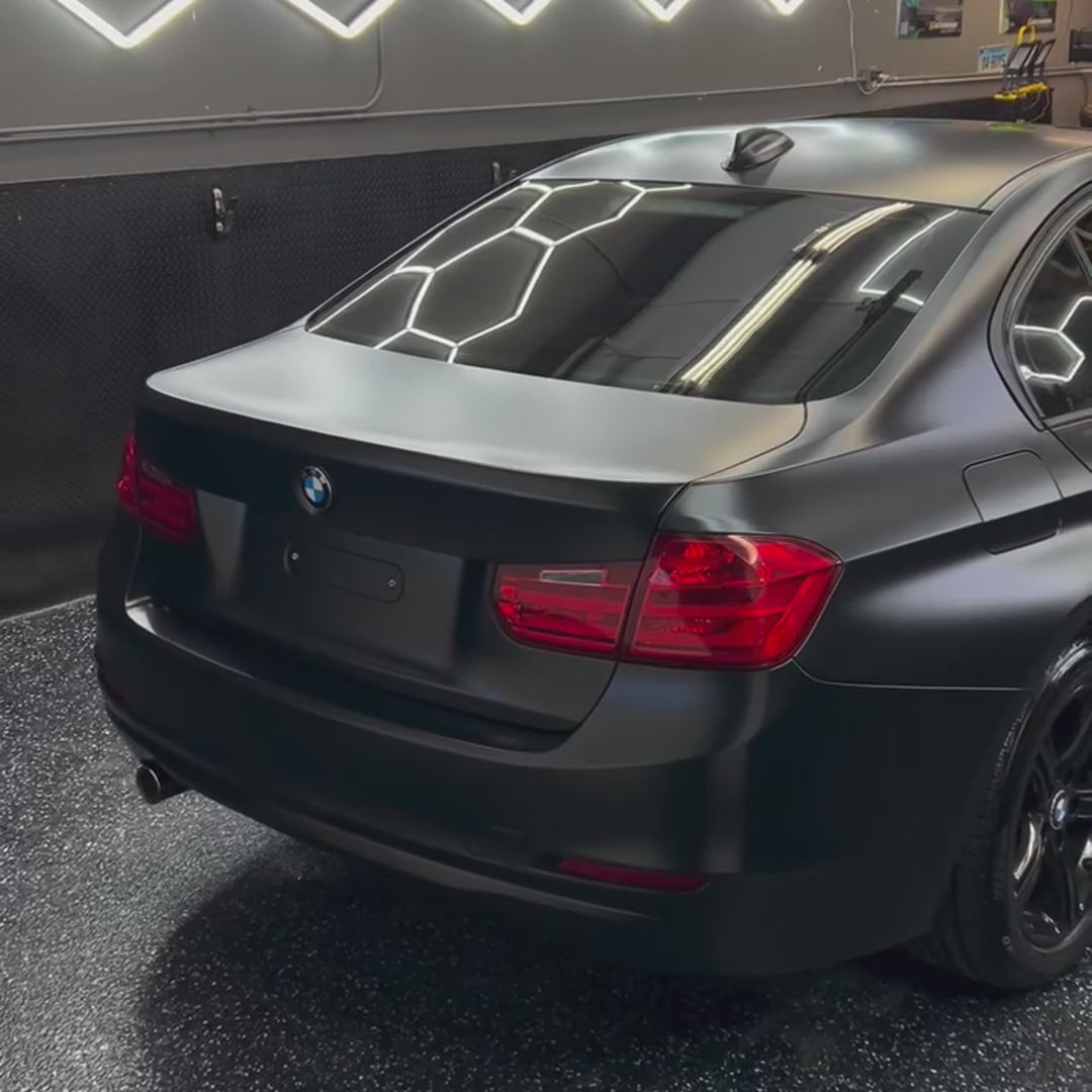 BMW 3 Series wrapped in TeckWrap Satin Navy Black vinyl (ECH15), showing the completed satin finish
