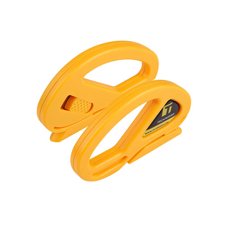 Angled view of TeckWrap Safety Cutter showing durable orange plastic body, finger grip design, and blade safety enclosure.