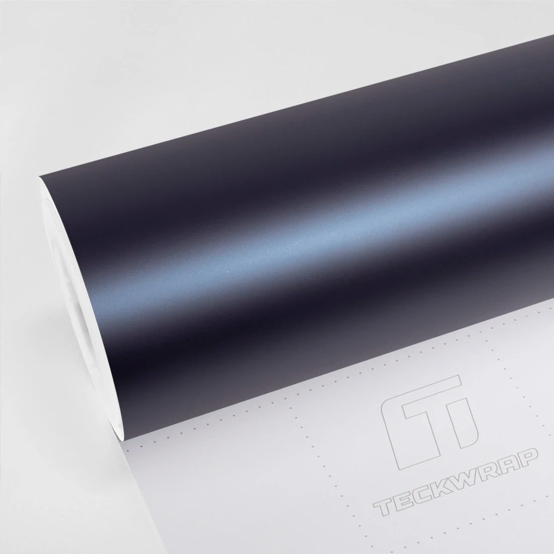 Satin Serge Blue Vinyl Wrap VCH419-M roll on TeckWrap liner showing a muted dark blue finish with a soft icy blue highlight