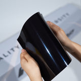 TeckWrap A5 Metallic PPF sample in black with subtle blue pearl reflection