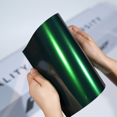 TeckWrap A5 Chameleon Special Effect Color PPF sample showing dark green base with vivid emerald light reflection