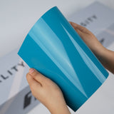 Bright cyan blue TeckWrap A5 Pure Color Paint Protection Film sample