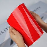 Bright red TeckWrap A5 Pure Color Paint Protection Film sample
