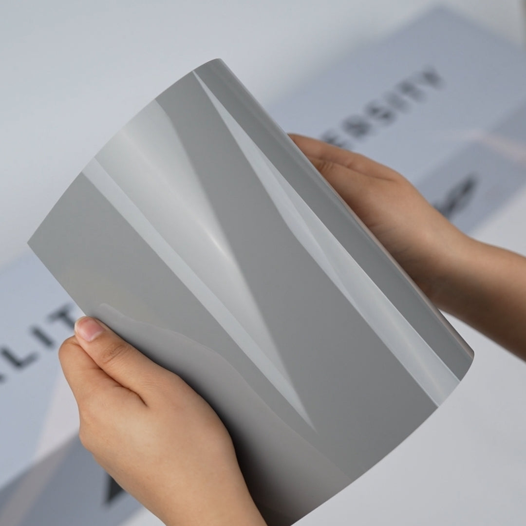 Light grey TeckWrap A5 Pure Color Paint Protection Film sample