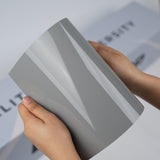 Light grey TeckWrap A5 Pure Color Paint Protection Film sample