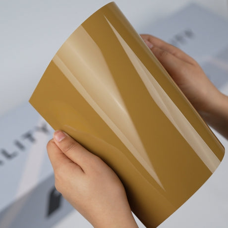 Mustard gold TeckWrap A5 Pure Color Paint Protection Film sample