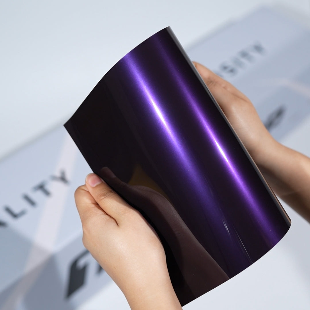 TeckWrap A5 Metallic PPF sample in deep purple with bright violet reflective streaks