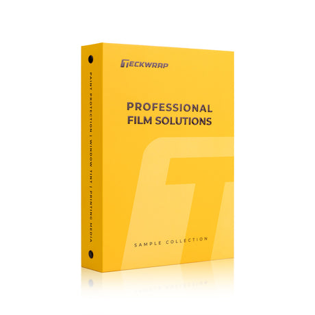Standing TeckWrap Clear PPF and Window Film Sample Book showing yellow cover and spine labels for paint protection, window tint, and printing media