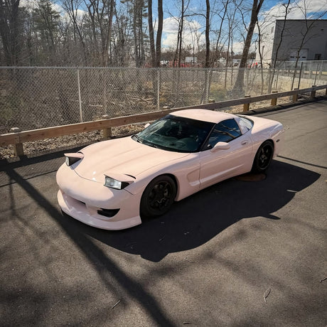 Mazda RX-7 wrapped in TeckWrap Super Gloss Strawberry Milk vinyl (CG50-HD), front three-quarter view