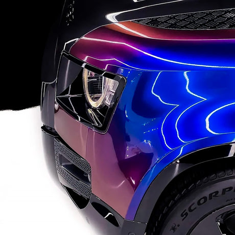 Detailed headlight close-up of SUV wrapped in TeckWrap Violet Sunrise (RD14-HD), emphasizing bold transitions from deep blue to vivid violet hues.