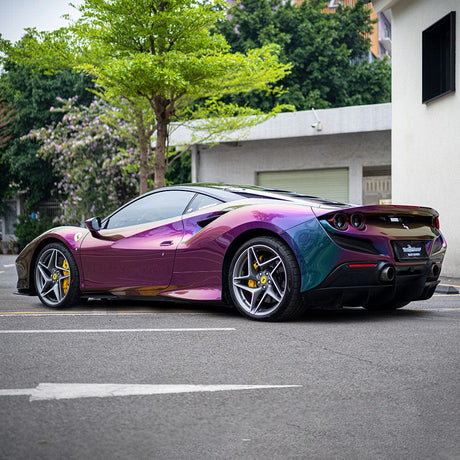 Rear angle of Ferrari wrapped in TeckWrap Purple Flame RD21PRO-HD chameleon wrap reflecting vivid hues